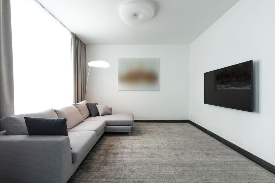 A freshly cleaned, pristine living room carpet